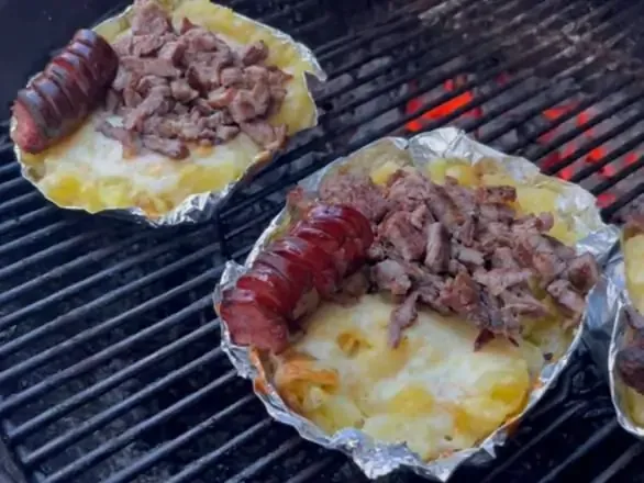 Baked potato with sausage