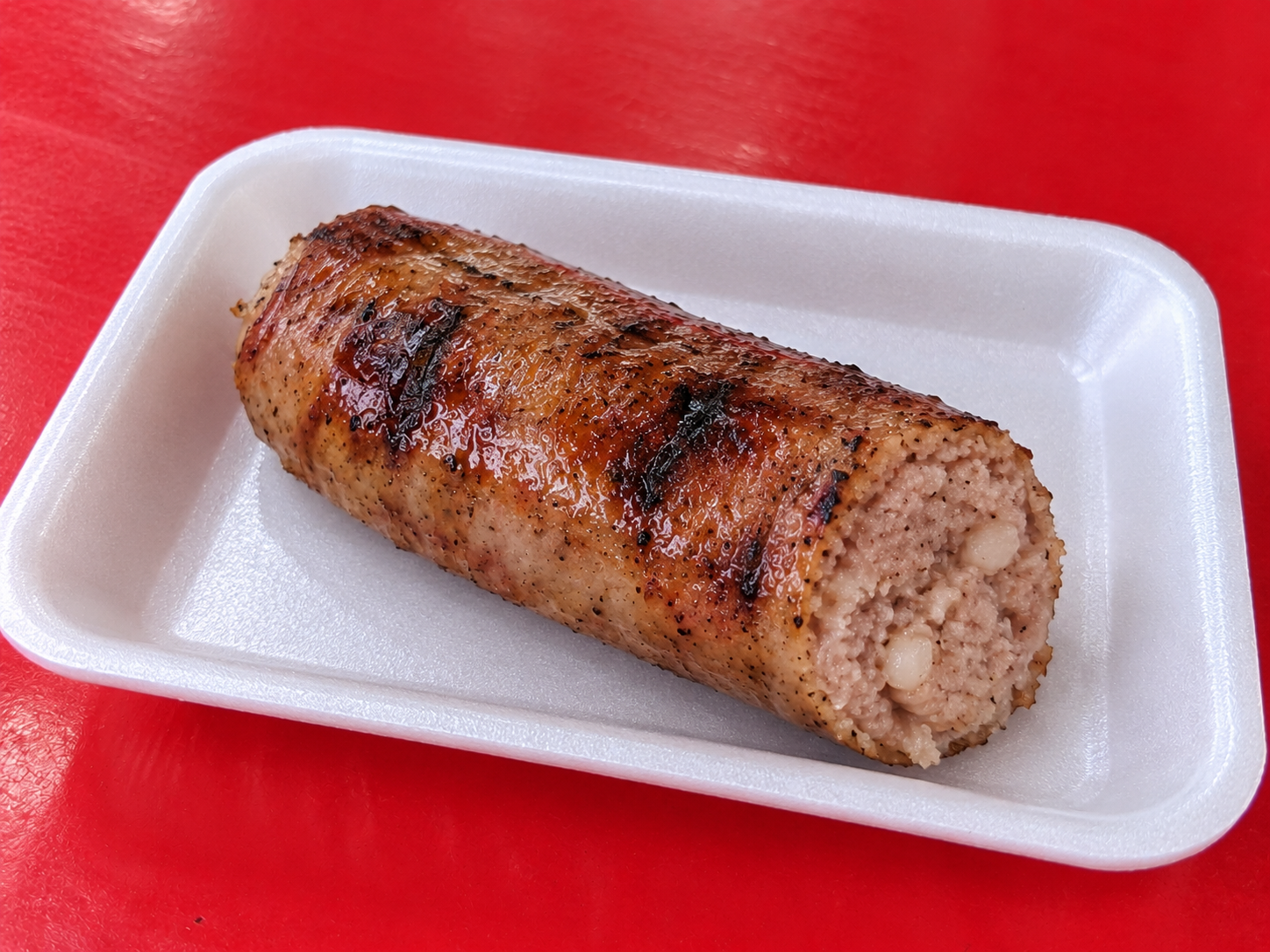1 salchicha asada extra